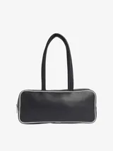 Bolso tipo shopper de diseño alargado, confeccionado en material sintético texturizado color negro con ribetes blancos. Presenta doble asa larga para llevar al hombro, cierre superior con cremallera y el logo del trébol de Adidas estampado en el frente.