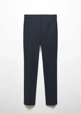 Pantalón de vestir azul marino, de corte skinny y diseño crop de tiro medio, con trabillas, bolsillos laterales y cierre frontal de cremallera y botón.