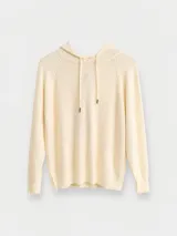 Buzo estilo hoodie confeccionado en tejido de punto color crema, con capucha y cordones ajustables. Presenta mangas largas con puños acanalados y un diseño de calce cómodo.