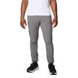 Pantalón técnico de senderismo color gris, con cintura elástica, bolsillos laterales con cierre y puños ajustables en los tobillos. Fabricado con tecnología Omni-Shade UPF 50 y Omni-Shield repelente al agua y manchas.