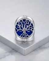 Anillo de plata 925 reversible con diseño de árbol sobre fondo azul de pasta de lapislázuli.