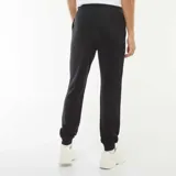 Pantalón de jogging negro, corte recto y tobillos ajustados.
