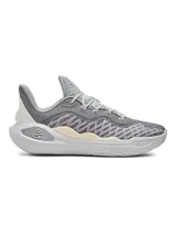 Championes de básquetbol Under Armour Curry 11, con tecnología de amortiguación UA Flow de doble densidad y tejido superior UA IntelliKnit transpirable. Presenta un diseño en tonos grises con detalles en crema y blanco, contrafuerte de TPU en el talón y placa Pebax en el antepié para mayor agilidad.