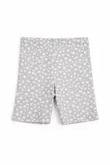 Biker short de tiro alto con estampado de pequeñas flores blancas sobre base gris melange.