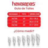 Ojotas Havaianas modelo Luna, color rosa nude, con tira fina trasera y diseño trenzado en la tira delantera.