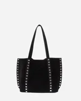 Bolso tote negro de gamuza con tachas plateadas en los laterales y doble asa de hombro.