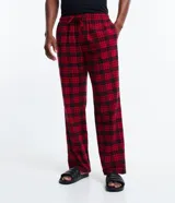 Pantalón de pijama de franela con estampado de cuadros en tonos rojos y negros, cuenta con cintura elástica y cordón de ajuste.
