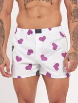 Bóxer de algodón blanco con estampado de corazones violetas y cintura elastizada.