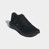 Championes de running Adidas Response Runner, completamente negros, con exterior de malla transpirable, tres franjas laterales en relieve y mediasuela de EVA.