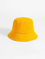 Gorro tipo bucket amarillo con textura tipo waffle.