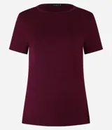 Blusa básica color mostaza, con escote redondo y manga corta.