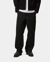 Pantalón de gabardina negro Carhartt WIP modelo Single Knee Pant, de corte recto y holgado con bolsillos laterales utilitarios.