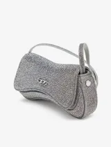 Cartera bandolera compacta Diesel Play Crossbody XS, de diseño curvo con acabado brillante plateado. Cuenta con el icónico logo Oval D en el frente y correa desmontable para llevarla cruzada o como clutch.