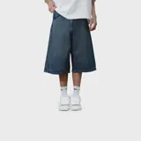 Bermuda baggy de denim azul oscuro con efecto desteñido, corte holgado y diseño largo por debajo de la rodilla.