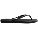 Ojotas Havaianas modelo Slim, de color rosado con tiras finas metálicas y textura de grano de arroz en la suela.