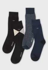 Pack de cuatro pares de medias de caña media marca Arrow, con diseños variados que incluyen colores lisos, rayas horizontales y patrón de rombos argyle.