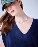 Sweater sin mangas de cuello V, color azul marino, confeccionado en cashmere.