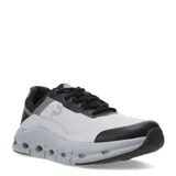 Championes deportivos unisex con diseño moderno, capellada de malla blanca y refuerzos en tono verde agua. Presentan una mediasuela voluminosa de color celeste con orificios laterales para mayor amortiguación y suela negra.