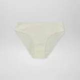 Pack de siete bombachas de corte clásico, confeccionadas en algodón liso en una variedad de colores pasteles y vibrantes, con terminaciones de picot en la cintura y aberturas de piernas.
