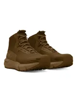 Botas tácticas Under Armour modelo Charged Valsetz Mid, color marrón, con diseño de caña media, parte superior sintética transpirable con refuerzos de PU y suela exterior Vibram de alta tracción.