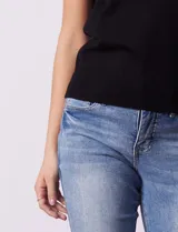 Buzo tejido en hilado fino color naranja, marca Ninety.