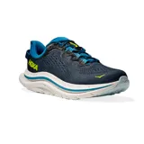Championes de running Hoka modelo Kawana 2, color azul marino con detalles en azul claro y amarillo neón. Presentan una suela de amortiguación gruesa con efecto moteado y diseño ergonómico para mayor estabilidad.