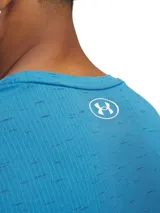 Remera deportiva Under Armour Vanish Seamless de manga corta, color azul con textura jaspeada. Presenta un diseño ergonómico sin costuras para reducir la fricción, con zonas de ventilación estratégicas y tejido elástico de secado rápido.