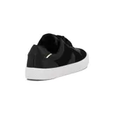 Champion deportivo de mujer, color blanco, con diseño de plataforma gruesa texturizada. Presenta recortes en el cuerpo y cordones negros.
