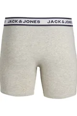 Pack de tres boxers ajustados de color gris claro, con cintura elástica en azul marino y logo de la marca en blanco. Fabricados en jersey ligero y elástico.