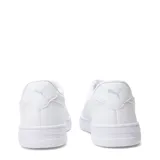 Championes urbanos Puma modelo Court Lally, de diseño clásico en color blanco total, con cierre de cordones y suela de goma resistente.