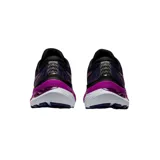 Championes de running Asics Gel-Kayano 29, color negro con detalles en fucsia y blanco. Presentan tecnología FF Blast+ en la entresuela para mayor amortiguación y diseño de malla transpirable.