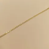Pulsera de oro amarillo 18k con eslabones tipo figaruchi.