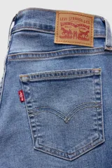 Jean de tiro alto y corte wide leg en color azul con efecto deslavado. Confeccionado en mezcla de algodón, poliéster y elastano, de elasticidad baja.