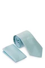 Corbata verde oscuro con estampado floral y pañuelo de bolsillo a juego.