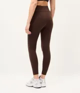 Pantalón legging deportivo color bordó, de tiro alto con cintura ancha y ajuste ceñido al cuerpo.