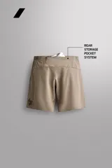 Short deportivo Zara Athleticz modelo Boulder 9", color beige, confeccionado en tejido técnico ligero y elástico. Cuenta con cintura elástica ajustable con cordón interior, bolsillos frontales y aberturas laterales en el bajo.