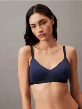 Corpiño Calvin Klein modelo Intense Power Micro, color azul con banda inferior negra con logo de la marca.