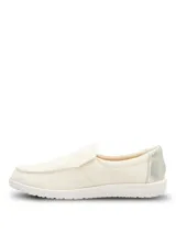 Zapatillas slip-on estilo alpargata color beige, con capellada de textil, suela de EVA liviana y diseño sin cordones.