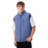 Chaleco acolchado reversible de la marca Rusty, color azul, con cierre frontal completo, cuello alto y bolsillos laterales. Presenta un bolsillo adicional con cierre en el pecho y etiqueta de la marca.