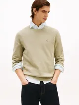 Sweater de hombre Tommy Hilfiger color beige de puro algodón con punto texturizado, cuello redondo y logo bordado en el pecho.