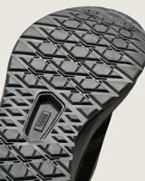 Championes Vans modelo Ultrarange 2.0, color negro con detalles en gris oscuro. Presentan un diseño técnico con entresuela UltraCush™ Lite para mayor amortiguación, sistema de ajuste con cordones y suela con patrón waffle inverso para mejor tracción.