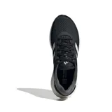 Championes de running Adidas Supernova 2.0, color negro con las icónicas tres tiras laterales en blanco y suela con tecnología de amortiguación blanca.