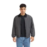 Campera Quiksilver modelo Milo de corte bomber, color gris con textura micro-cuadros, cuello camisero en contraste negro, cierre frontal completo y puños elásticos.