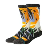 Medias Stance con diseño abstracto en colores negro, naranja, amarillo, celeste, blanco y verde.