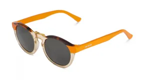 Lentes de sol Mr Boho modelo Jordaan, con montura redonda de acetato color carey y naranja, y lentes grises.