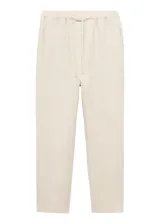 Pantalón recto de lino color beige, con cintura elástica y cordón ajustable.