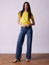 Buzo tejido en hilado fino color naranja, marca Ninety.