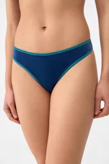 Colaless de terciopelo color azul con finos ribetes en tono verde turquesa en los bordes.