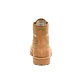 Bota de caña media Caterpillar modelo Colorado, confeccionada en una combinación de gamuza y canvas color marrón. Presenta cierre con cordones, ojales metálicos dorados, suela de goma dentada y logo de la marca en el lateral.