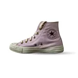 Championes Converse modelo Chuck Taylor All Star de caña alta, color rosado, con suela de goma blanca y cordones al tono.